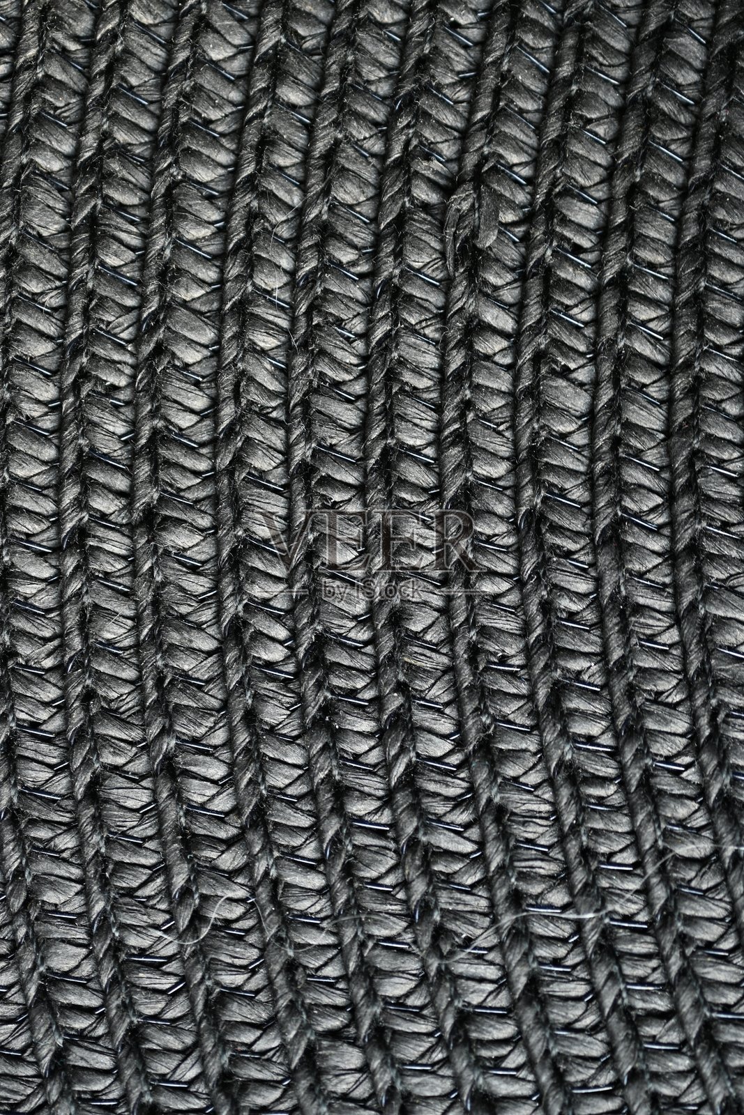 宏观黑色纸帽纹理作为背景，巴拿马帽纹理特写，巴拿马帽纸。照片摄影图片