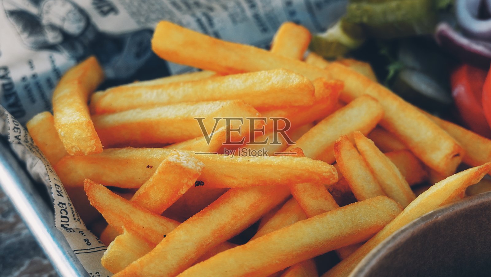 金黄酥脆的美味薯条特写照片摄影图片