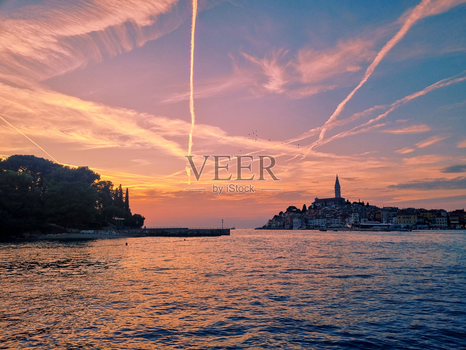 克罗地亚海边的日落照片摄影图片