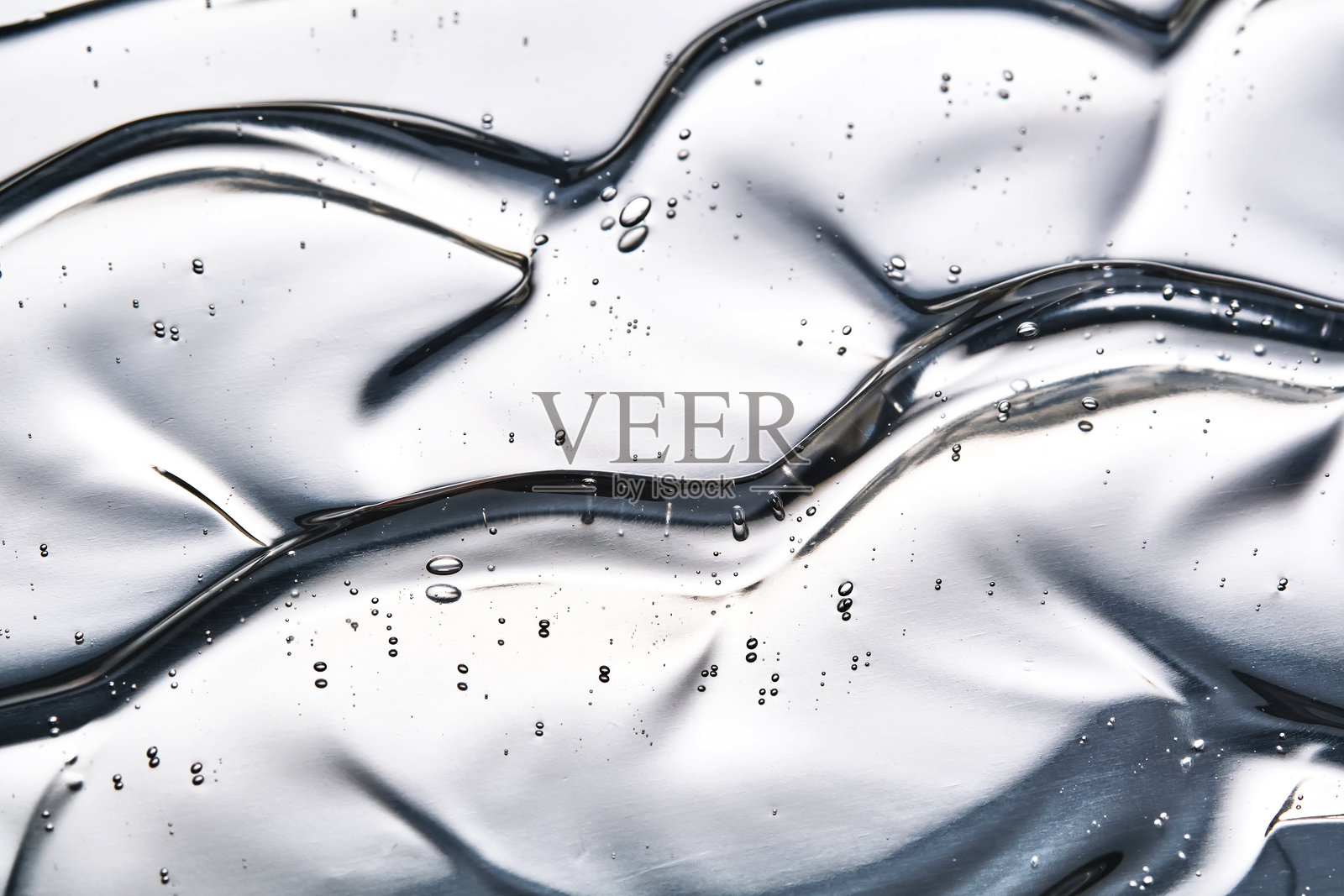 发胶或面部透明质酸凝胶的质地。照片摄影图片