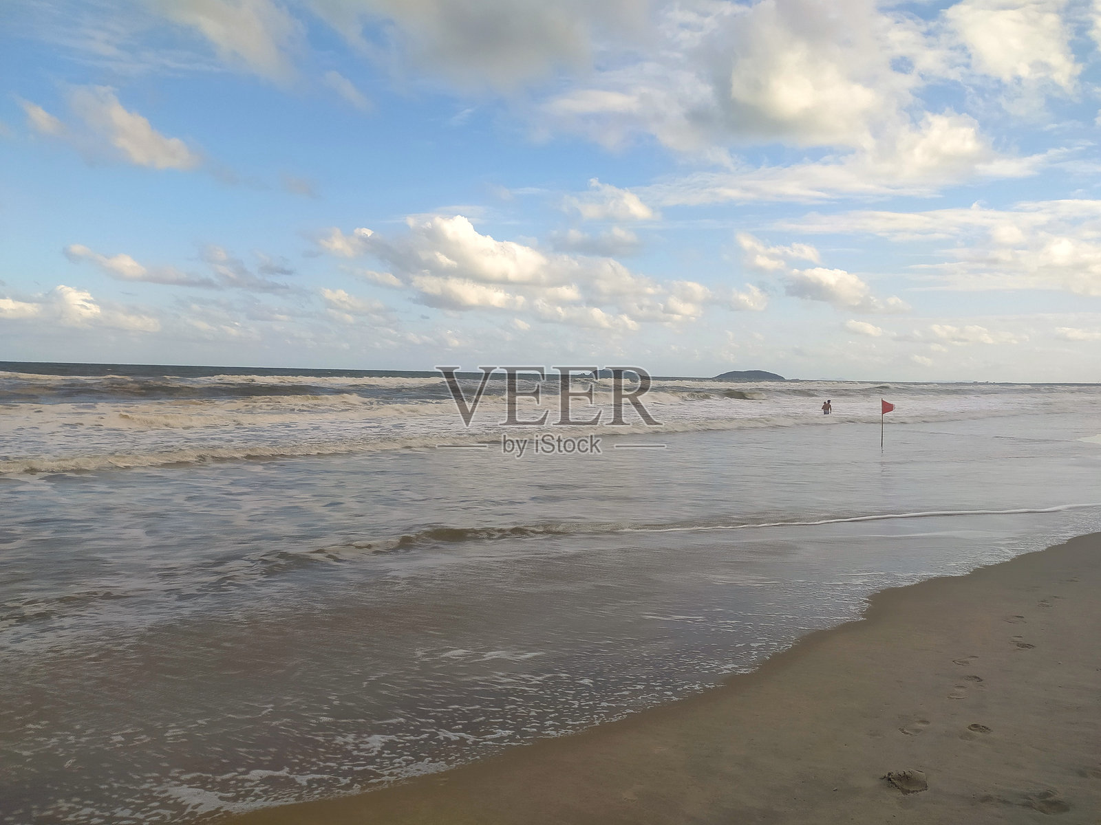 日落时的海滩照片摄影图片