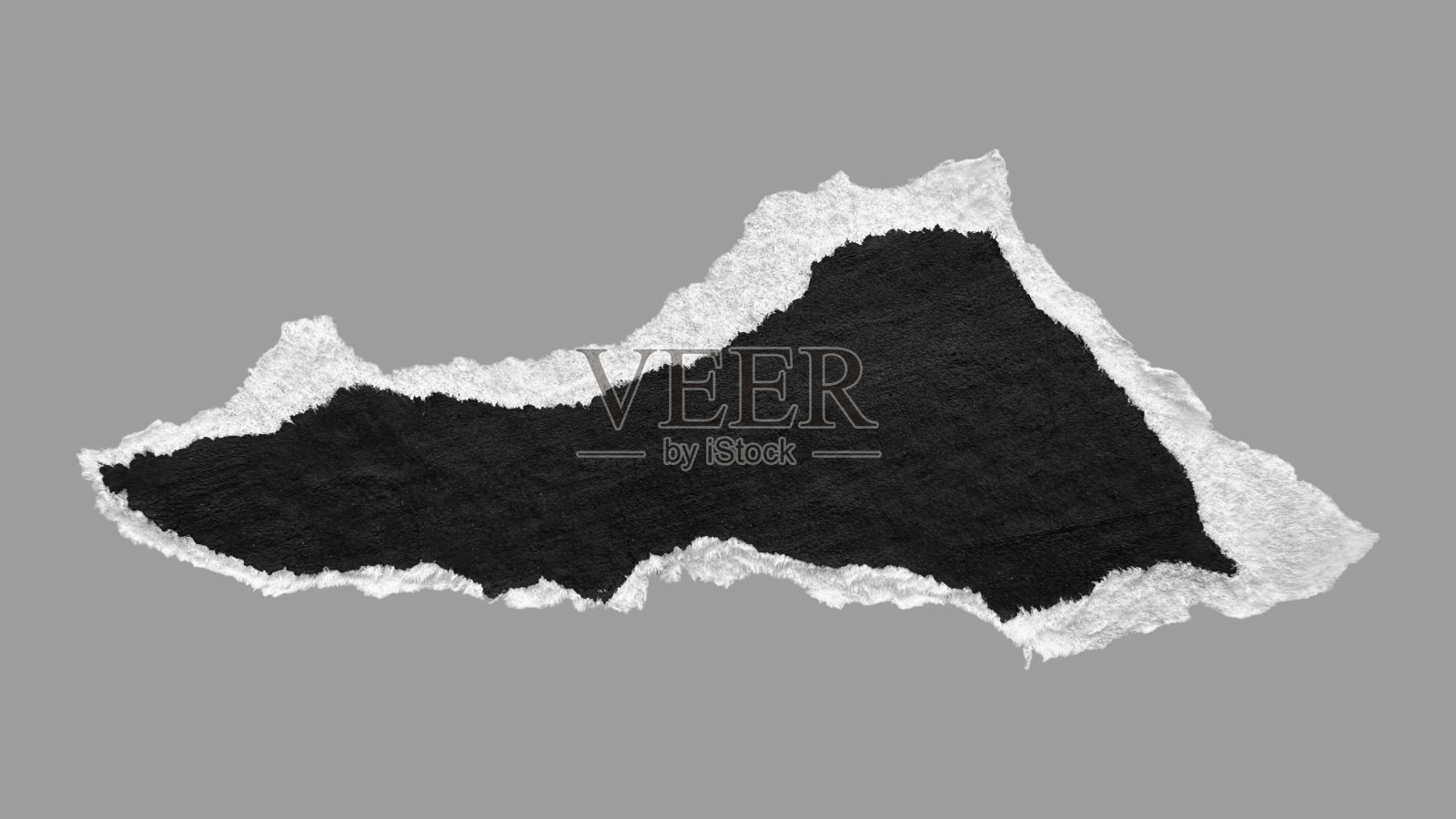 黑白撕裂纸片照片摄影图片