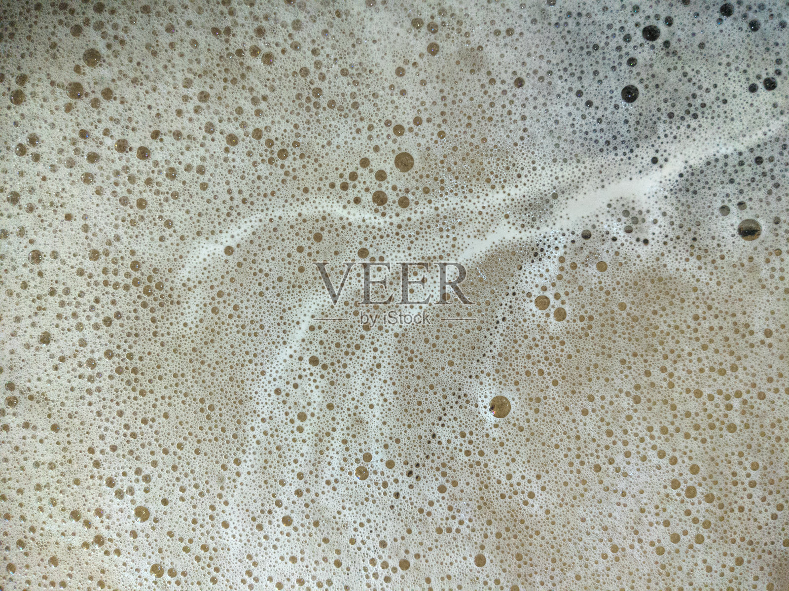 水面上泡沫气泡的背景照片摄影图片