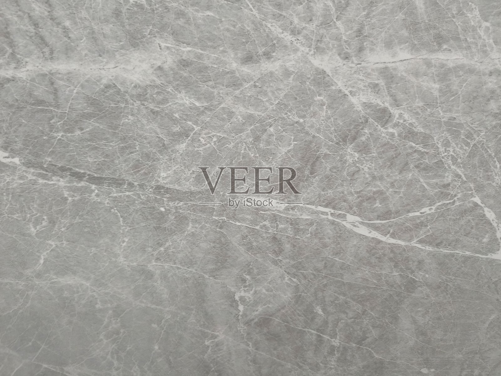 奢华的灰色大理石纹理。自然花岗岩背景适用于背景、展示、演示和模型。花岗岩用于墙壁和地板瓷砖设计。适合外部或内部设计和装饰的创意。照片摄影图片