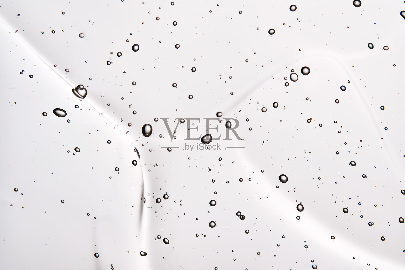 发胶或面部透明质酸凝胶的质地。照片摄影图片