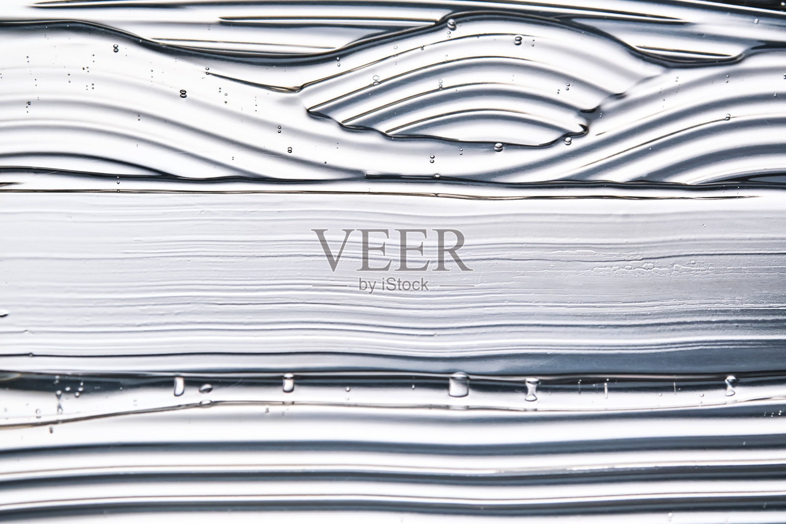 发胶或面部透明质酸凝胶的质地。照片摄影图片