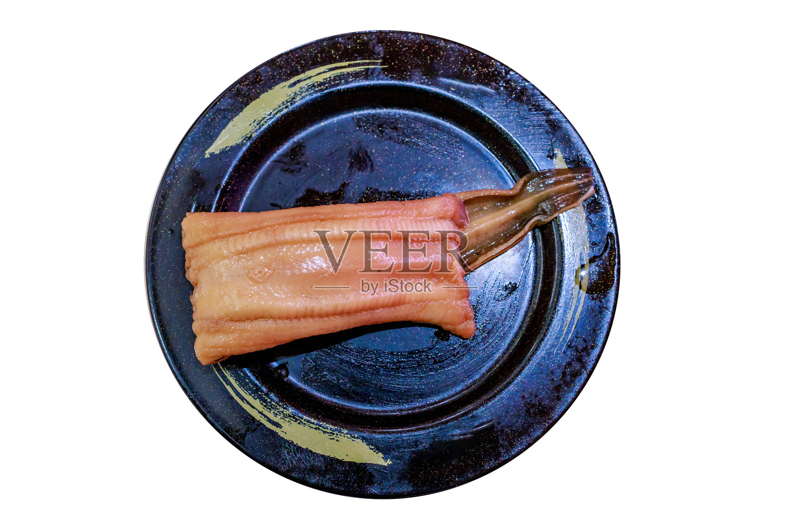 俯视整条煮熟的鳗鱼与米饭，聚焦选择性景深照片摄影图片