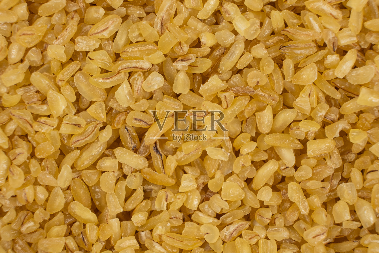 从上方俯瞰的散落小麦粒背景特写照片摄影图片