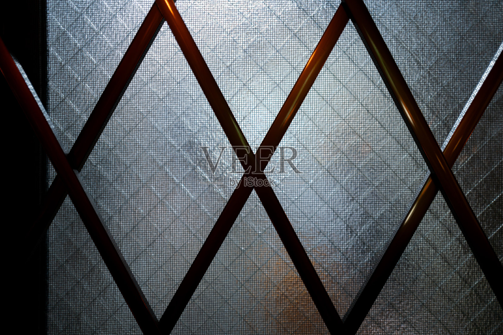 带有格子花纹的玻璃窗材料。照片摄影图片