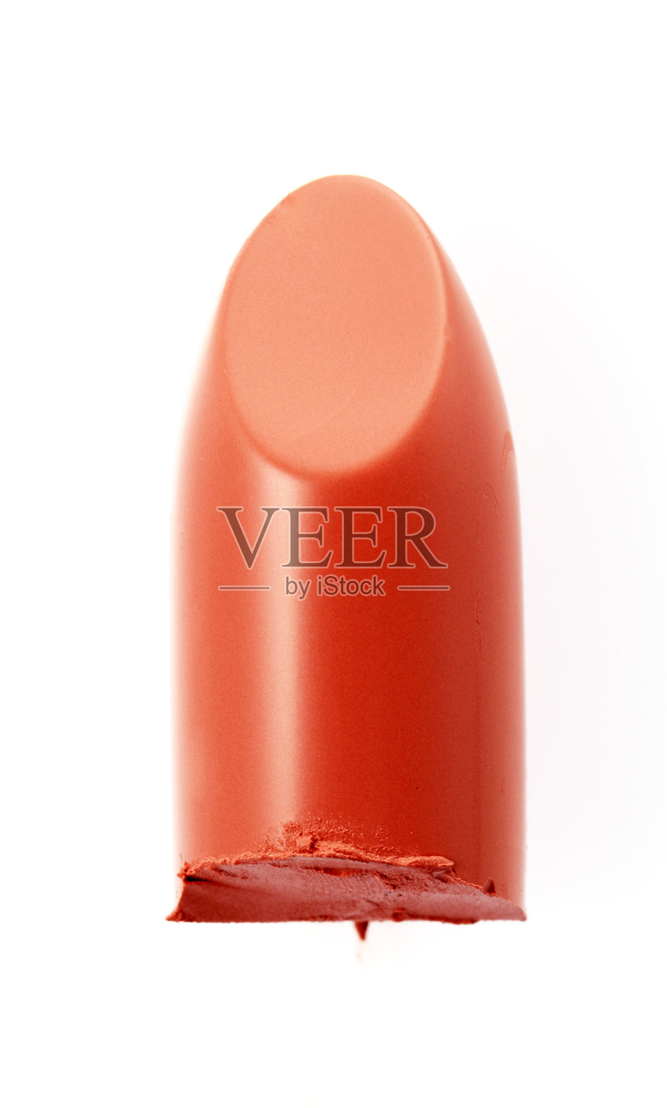 橙色口红在背景上切割的效果照片摄影图片