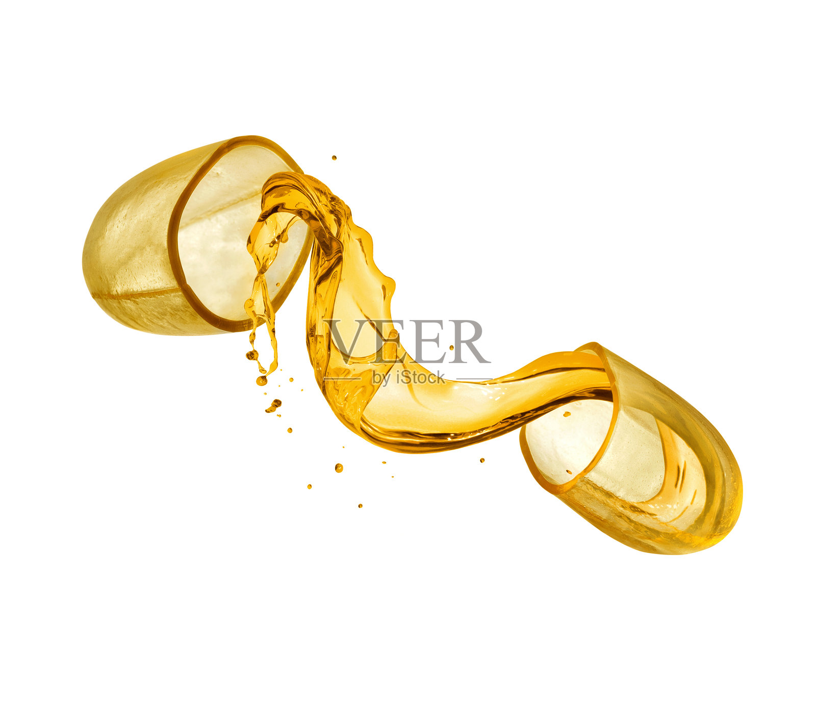 鱼油胶囊切成两半，旁边溅起的油脂特写照片摄影图片