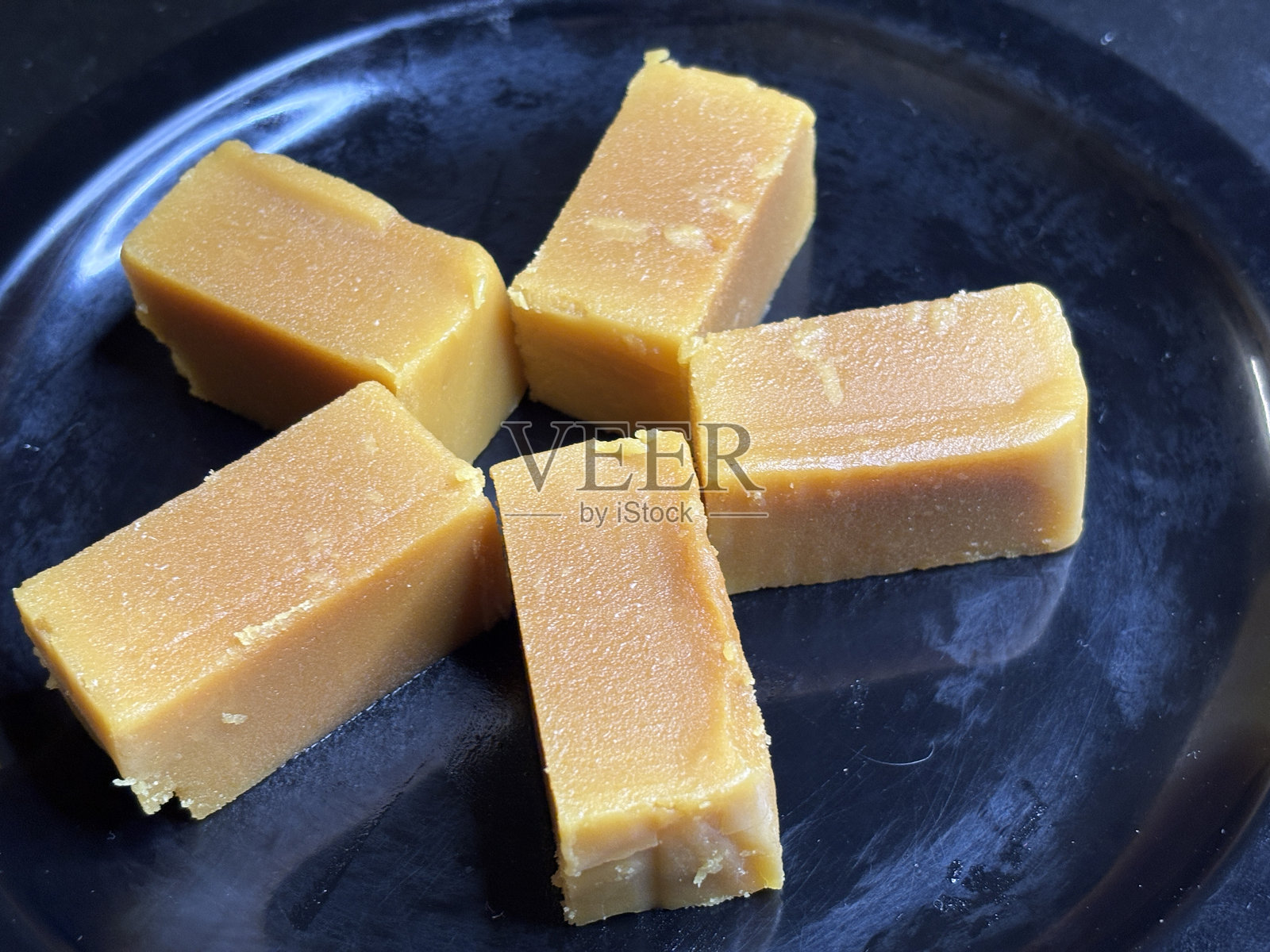 创意镜头中的酥油迈索尔糕照片摄影图片