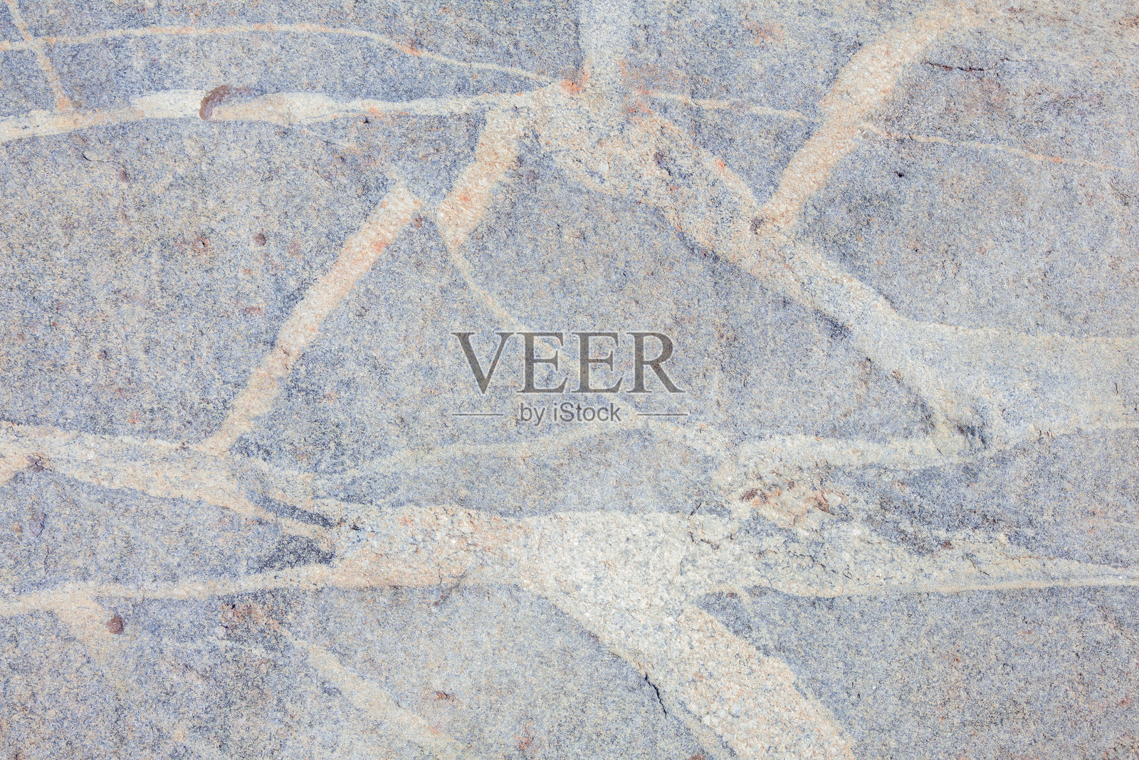 灰色岩石上的自然纹理。照片摄影图片