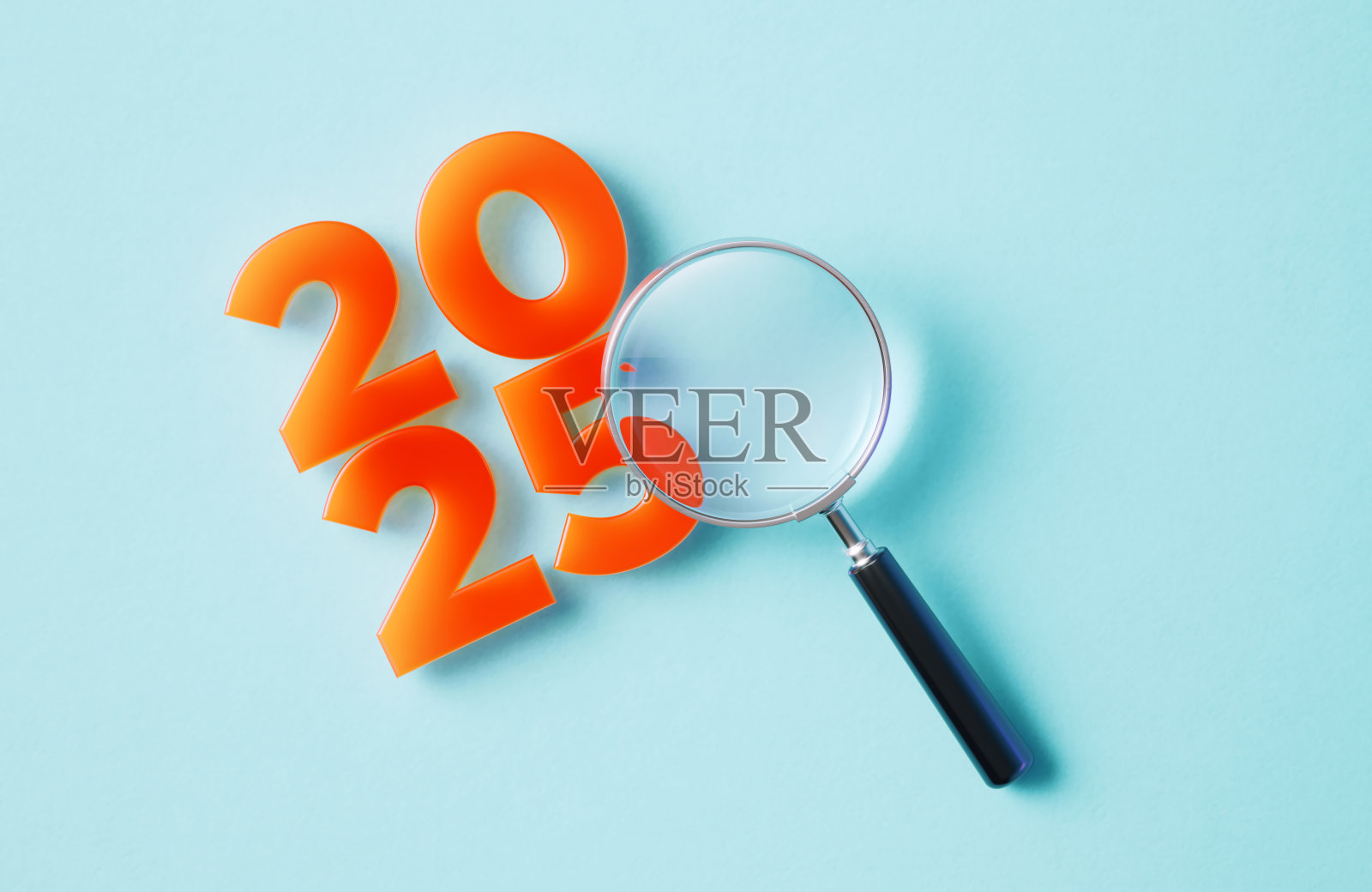 蓝色背景上的放大镜和橙色的2025照片摄影图片
