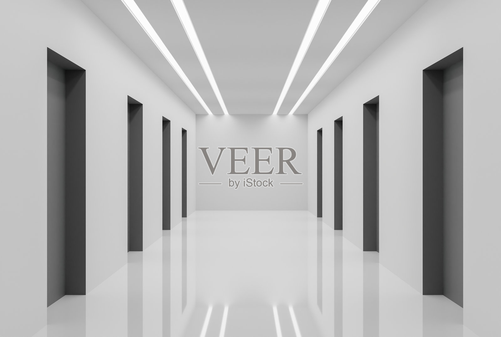 现代白色走廊有明亮的天花板灯和光滑发亮的瓷砖地板。照片摄影图片