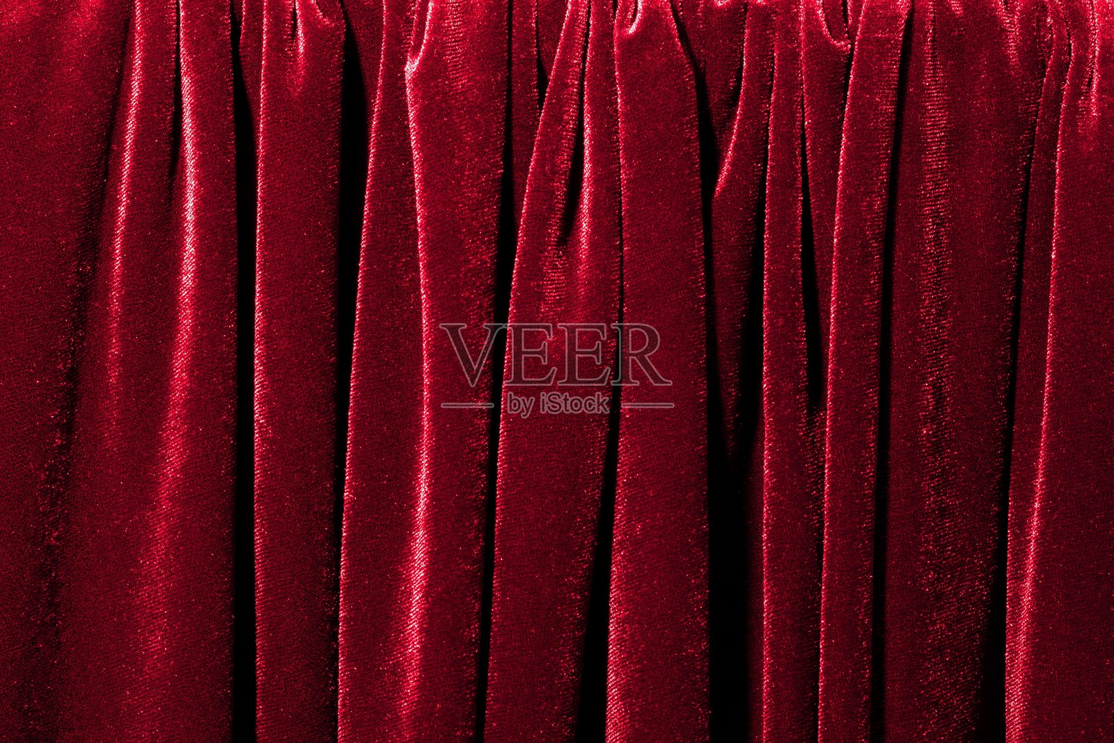 红色天鹅绒窗帘特写作为背景照片摄影图片