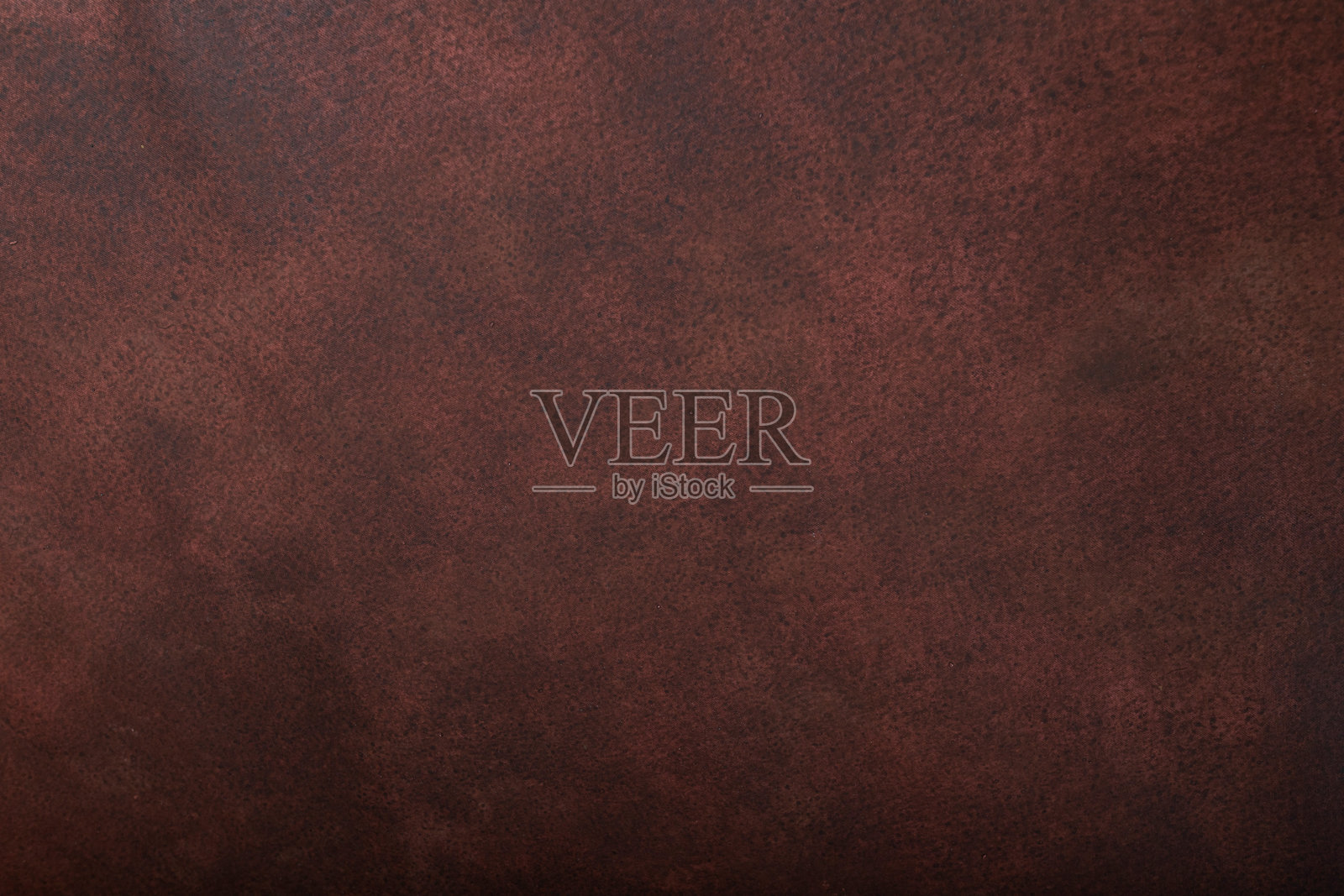 红棕色墙壁，带有留白的库存照片。背景，抽象纹理。空旷的旧墙，竖版照片。新年贺卡的背景。留白。照片摄影图片