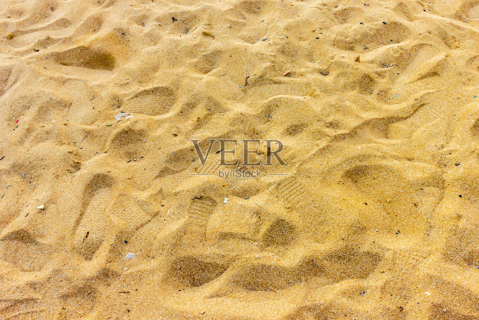 金色沙滩的特写视图，展现出纹理图案照片摄影图片