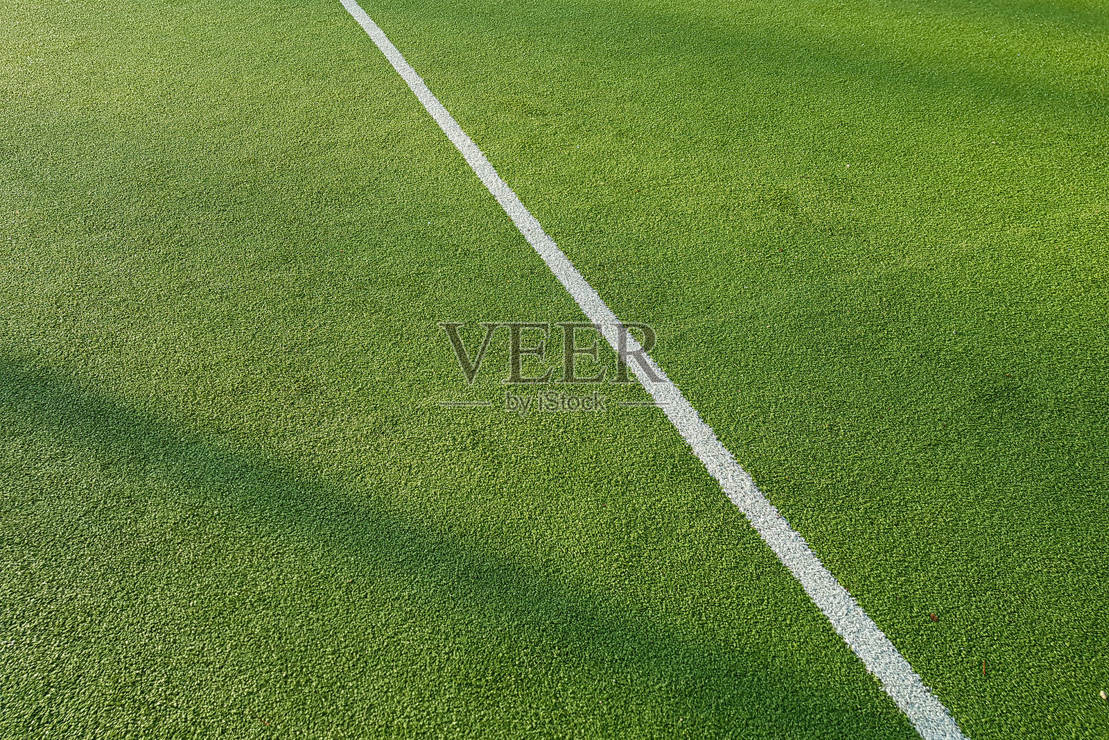 绿色草地背景与白色线条照片摄影图片