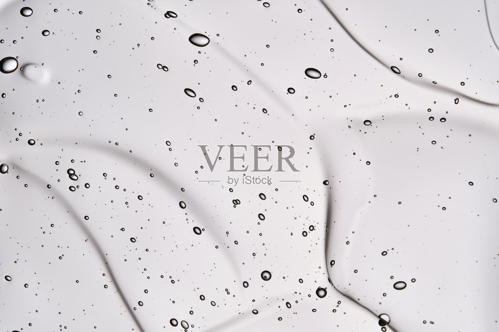 发胶或面部透明质酸凝胶的质地。照片摄影图片