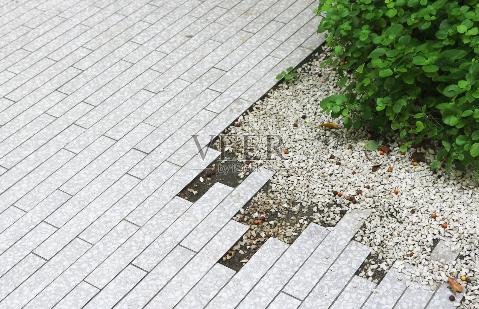 户外花岗岩地砖图案纹理背景。照片摄影图片