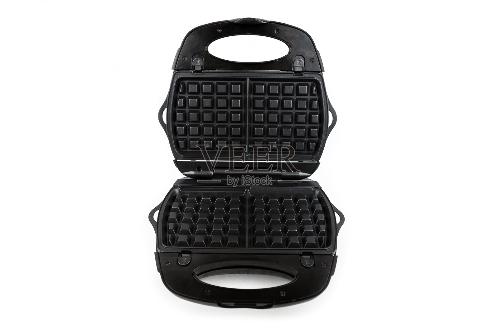 白色背景上的华夫饼机。用于制作比利时华夫饼的华夫饼机。照片摄影图片