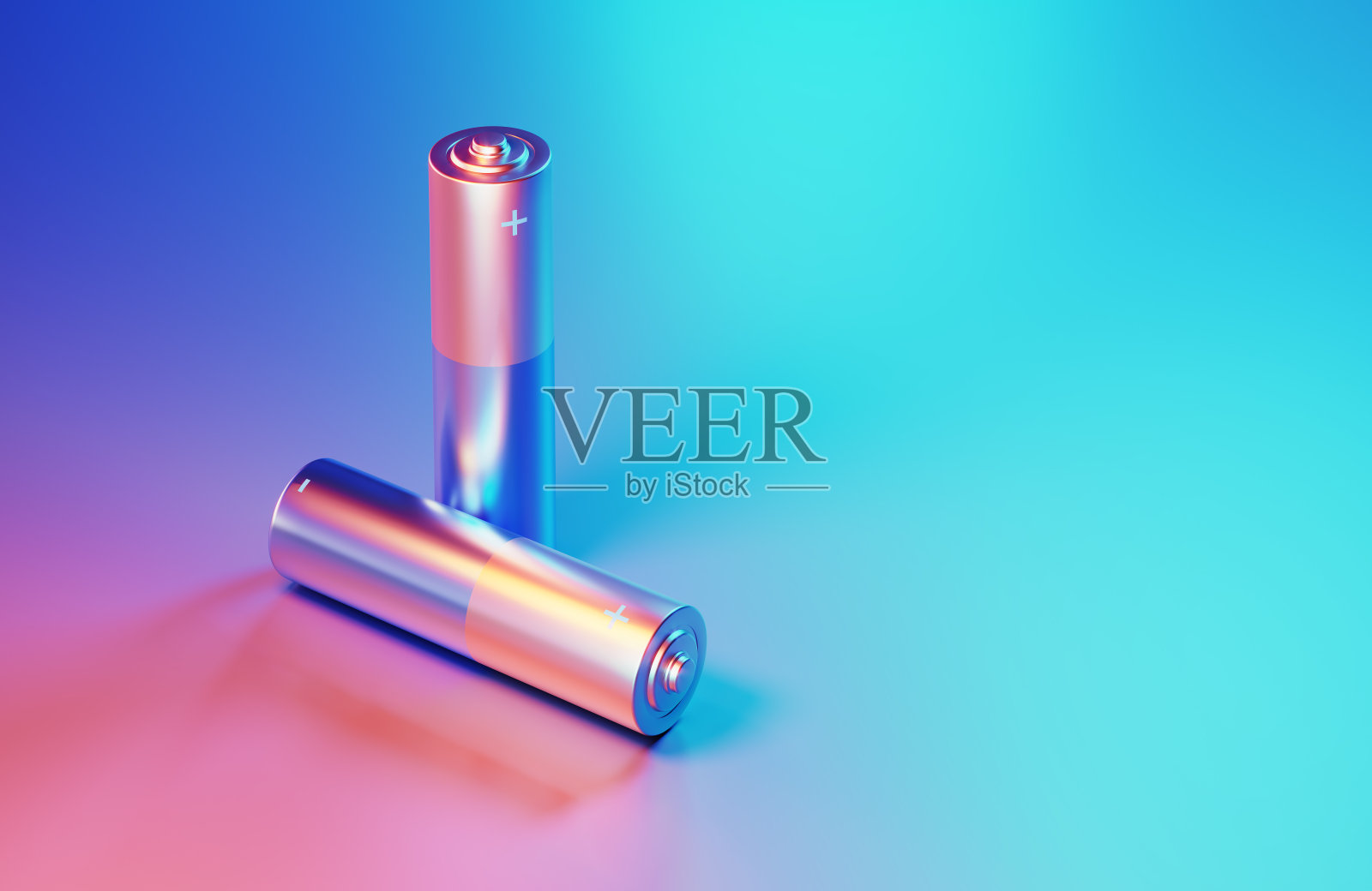 蓝色和粉色背景下被蓝色和粉色灯光照亮的电池照片摄影图片