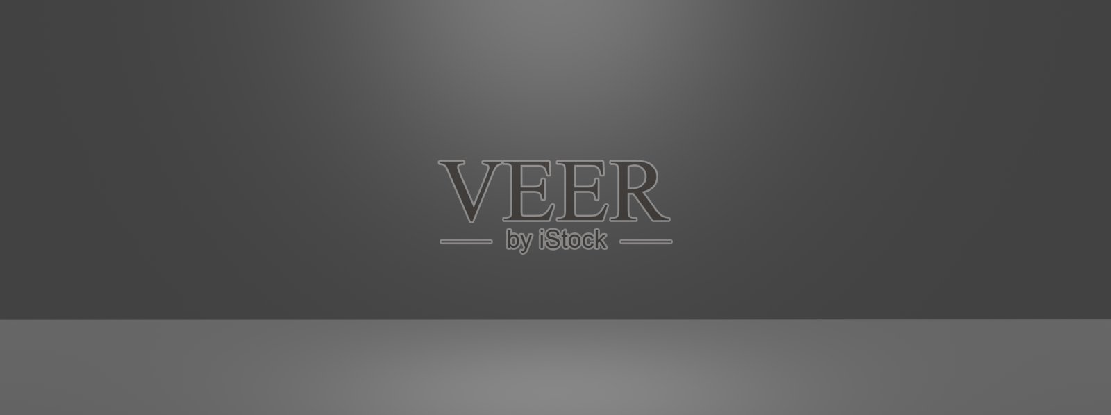 黑色和灰色的背景营造出一个干净、空旷的房间，光滑的水泥地面非常适合作为现代背景，具有细腻的纹理，适合极简主义的展示。照片摄影图片