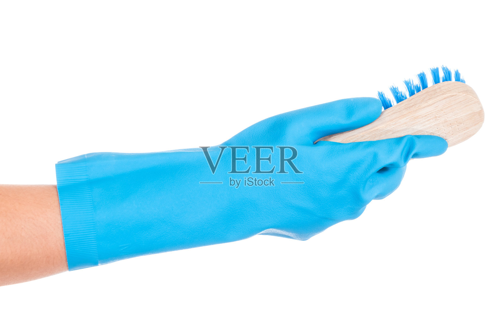 白色背景下的手握画笔照片摄影图片