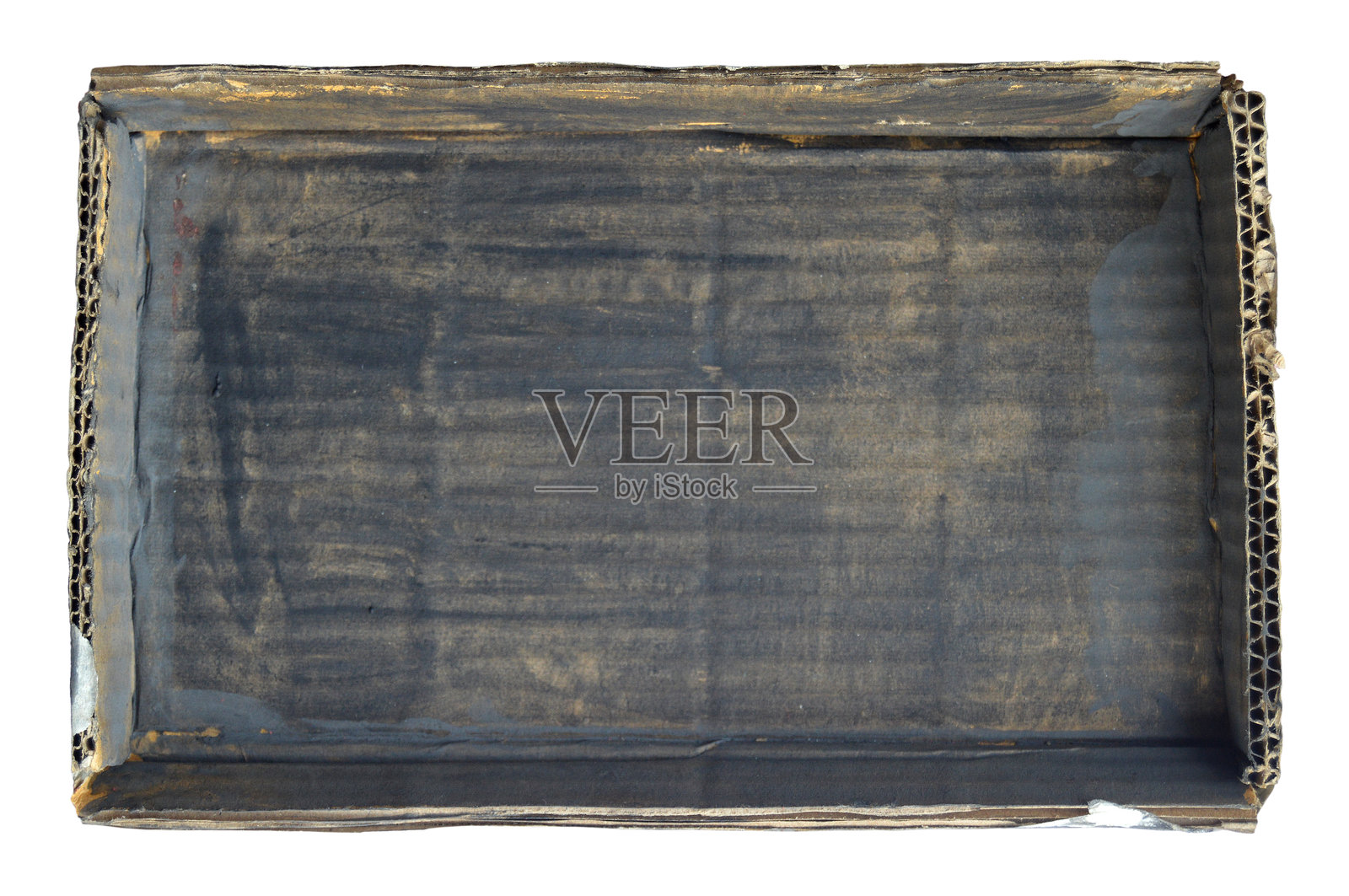 棕色波纹3D凹槽空白纸箱，涂有模糊不均匀的脏灰黑色油漆或不均匀的颜色。照片摄影图片