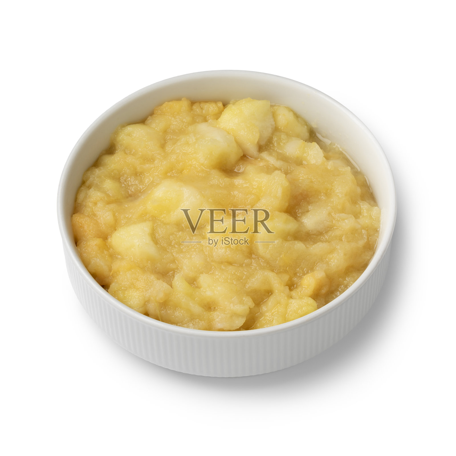 白色背景下的陶瓷碗盛有自制有机苹果酱特写照片摄影图片