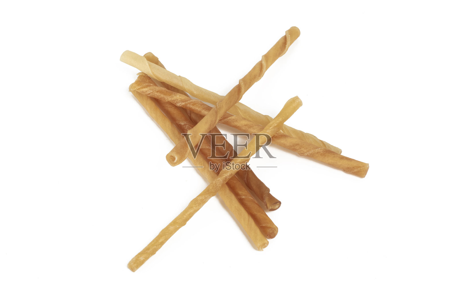 白色背景上的狗零食照片摄影图片