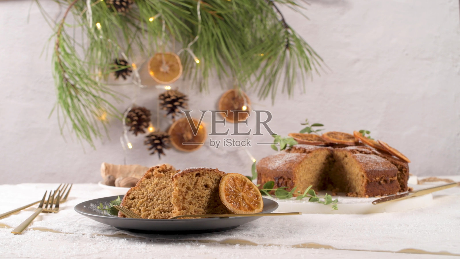 切片圣诞橙子蛋糕照片摄影图片