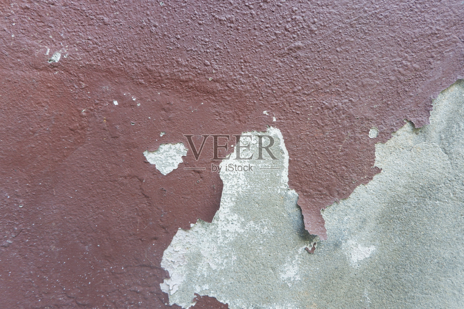 水泥墙面因涂料剥落而造成的表面。照片摄影图片