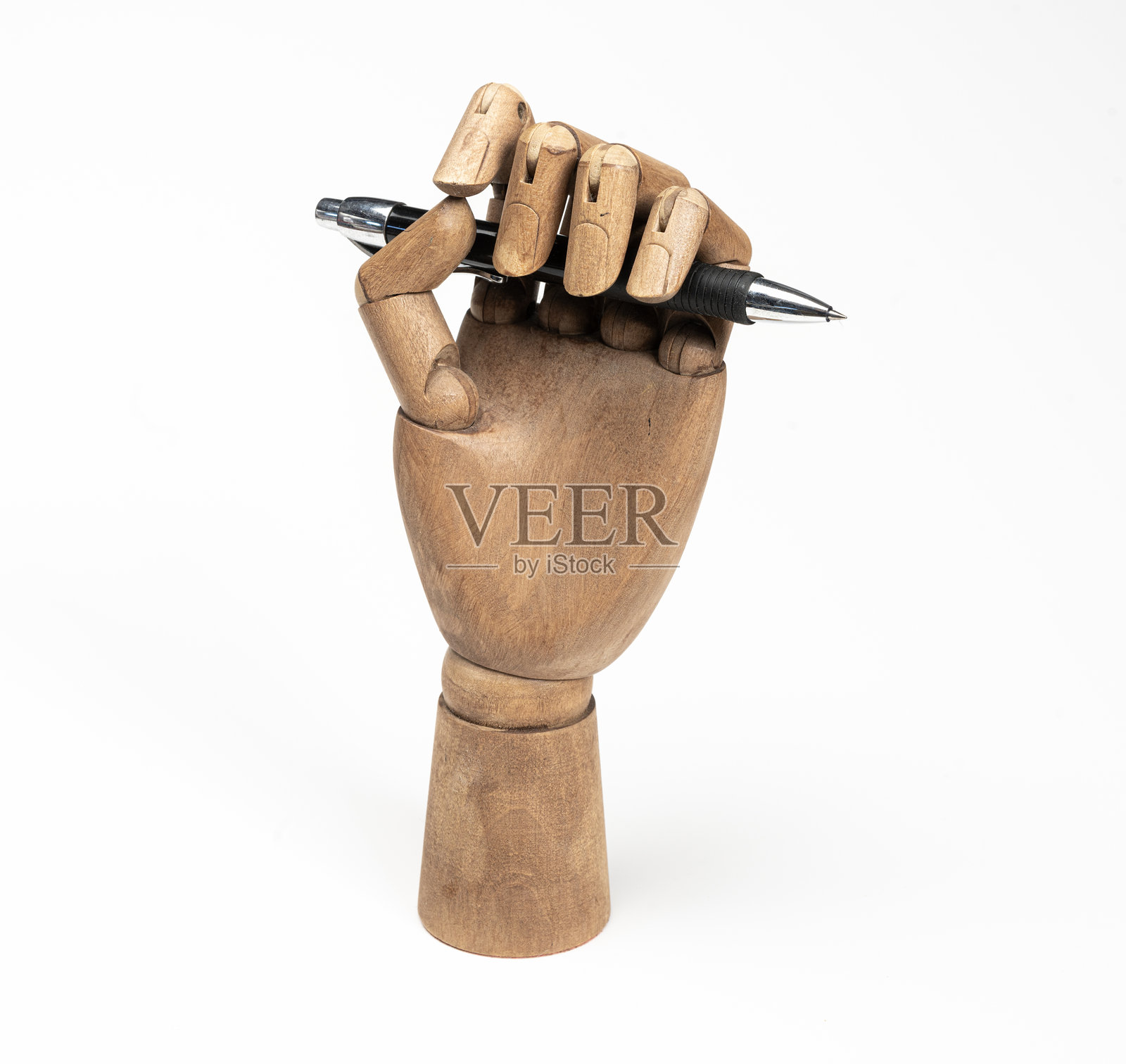 一只笔在木制手中照片摄影图片