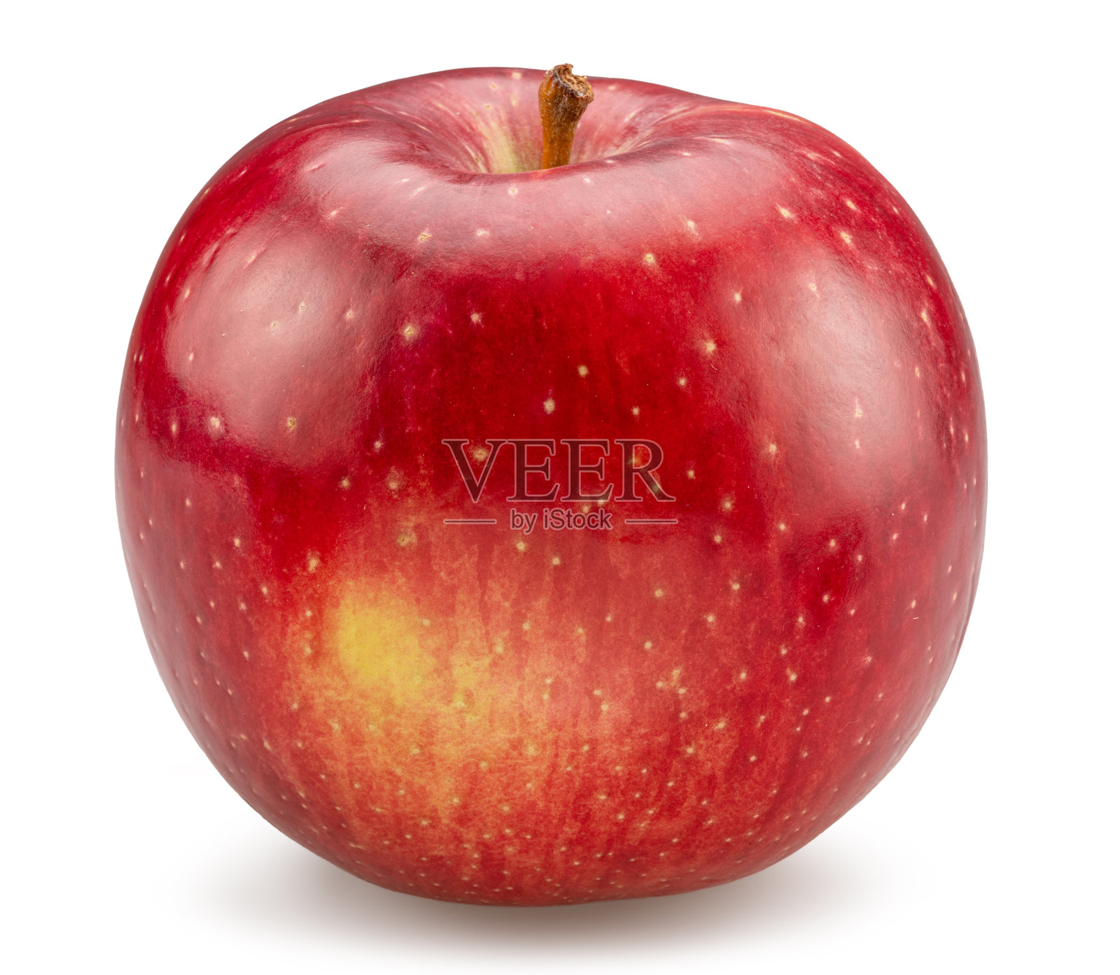 成熟的红苹果上有黄色斑点，背景为白色。文件包含抠图路径。照片摄影图片