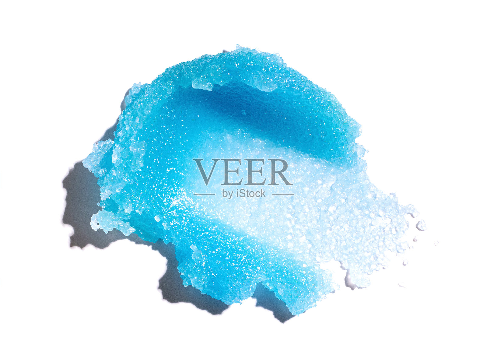 白色背景上的化妆品涂抹磨砂膏质地照片摄影图片