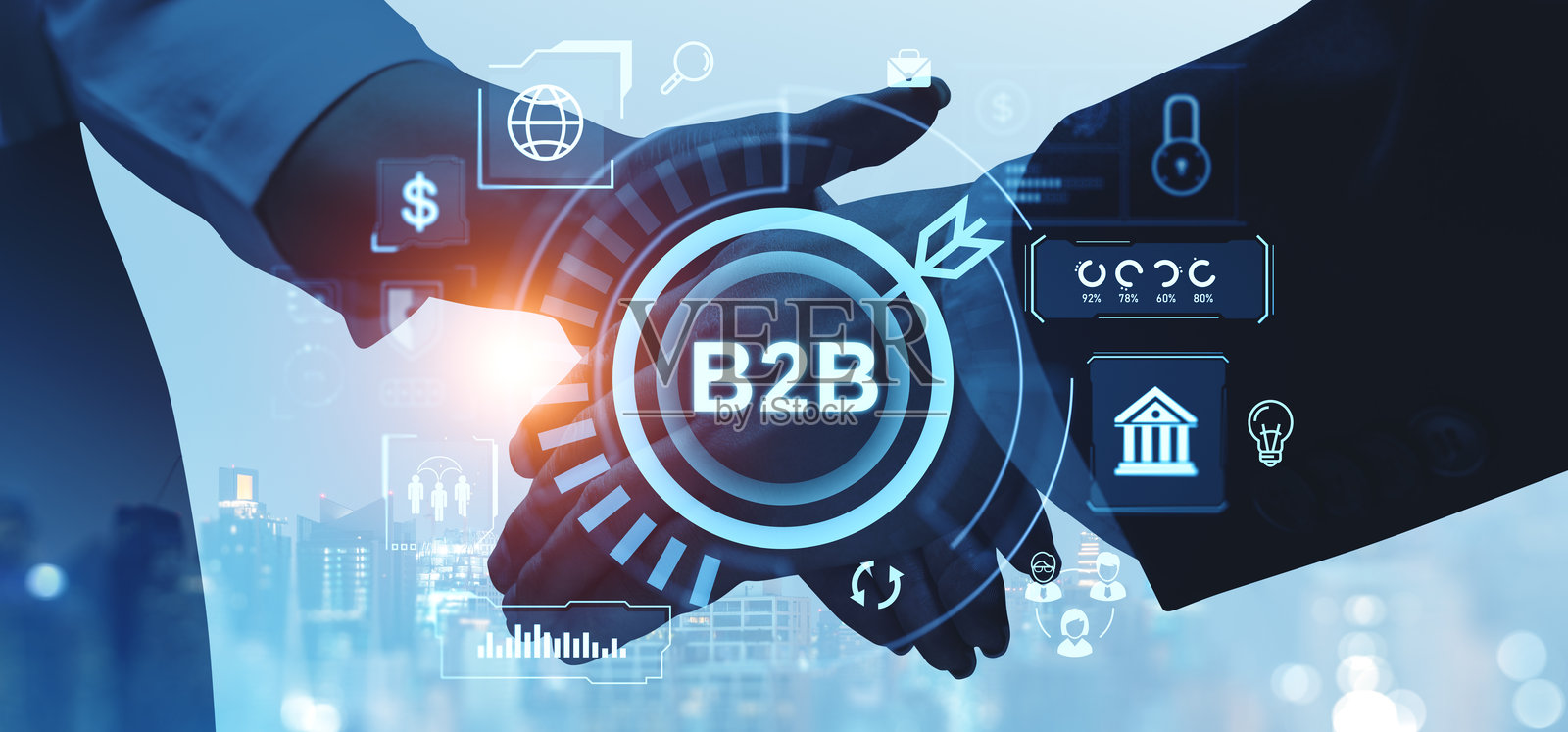 蓝色背景上的商业握手，配有B2B文本和图标。照片摄影图片