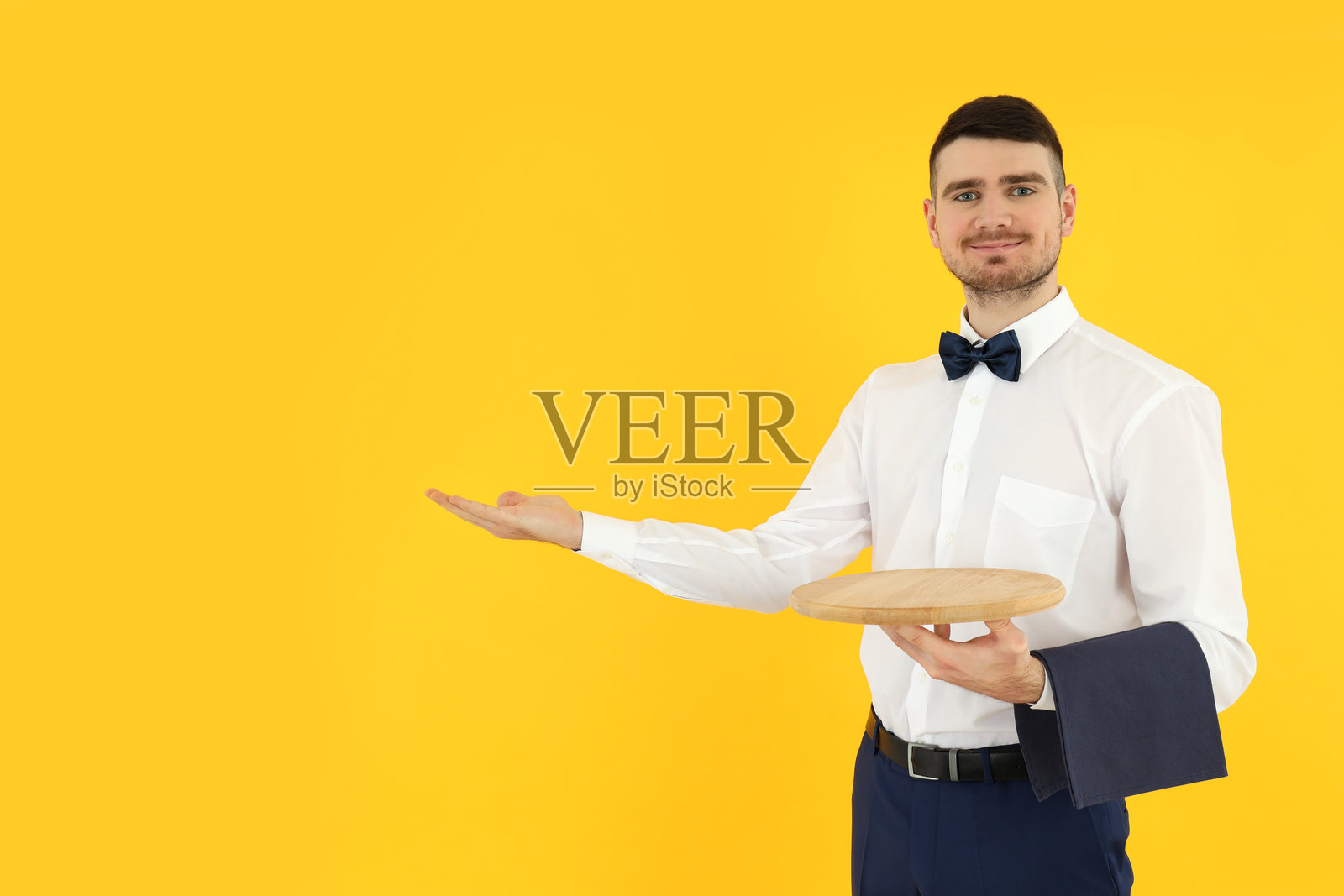 年轻男服务员的职业概念照片摄影图片