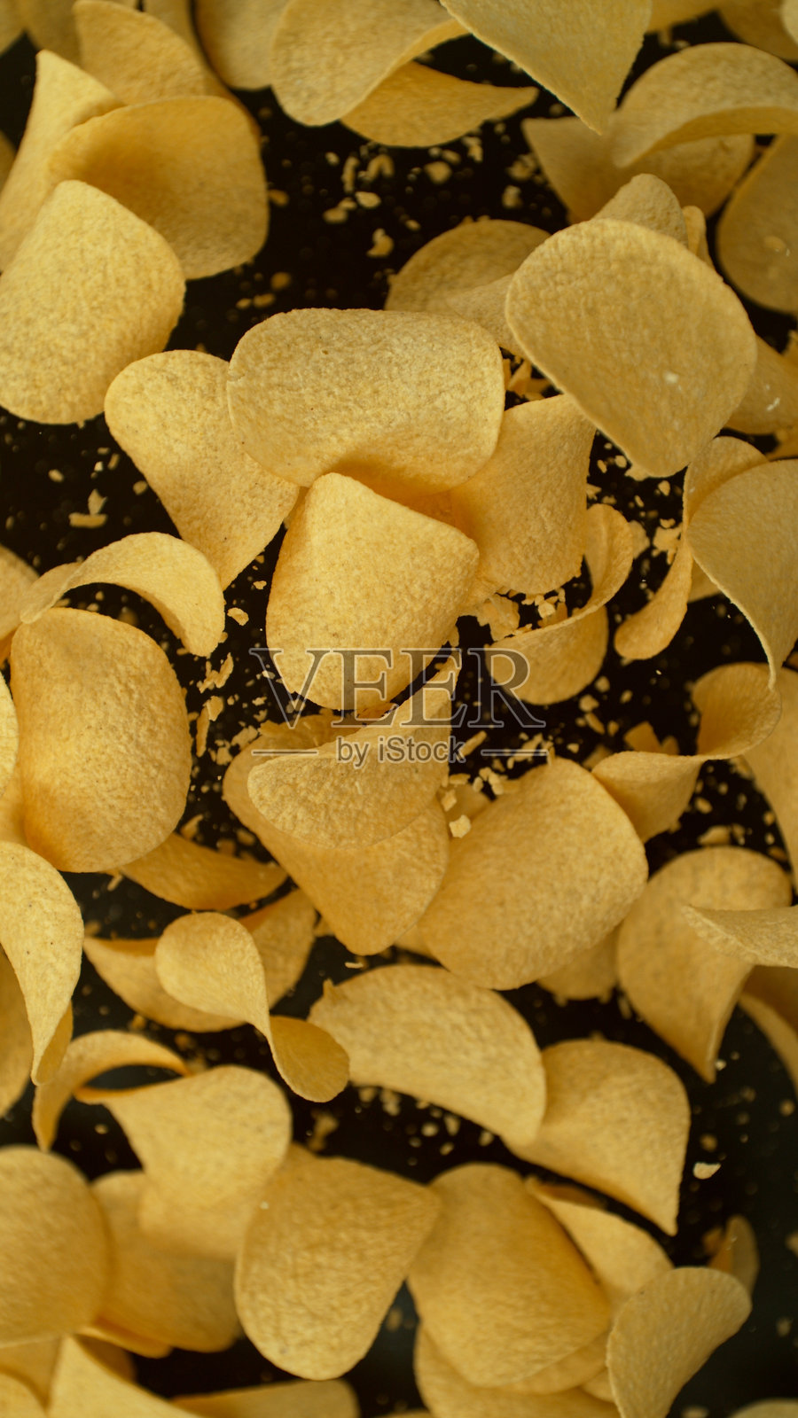 飞翔的炸薯片的动态冻结照片摄影图片