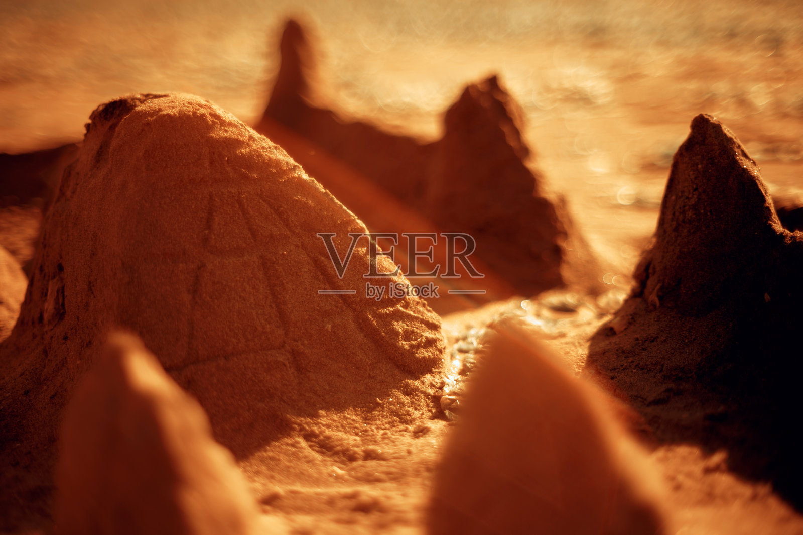 黄金时刻的沙雕照片摄影图片