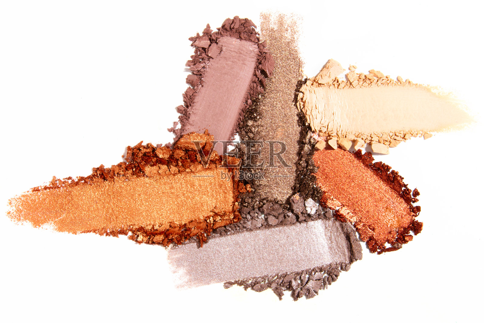 在浅白色背景上的眼影涂抹组合。化妆质地，色彩鲜艳且层次分明。照片摄影图片