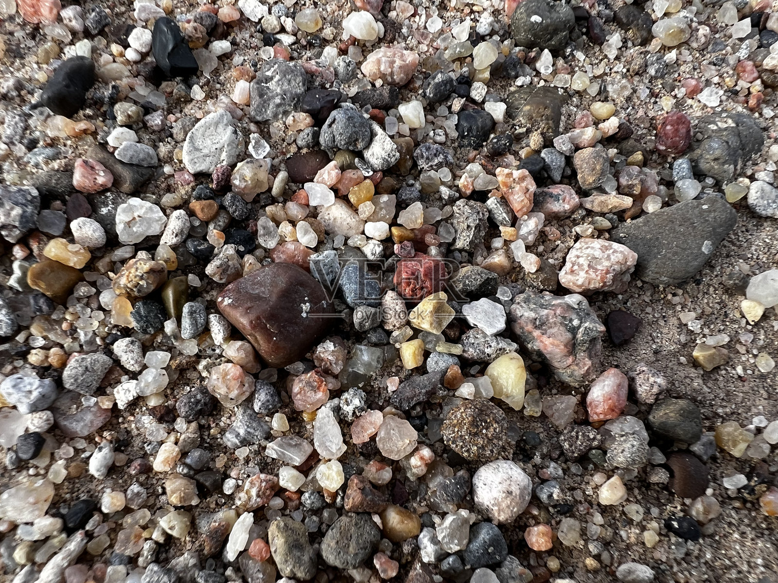 五彩斑斓的卵石和沙子照片摄影图片