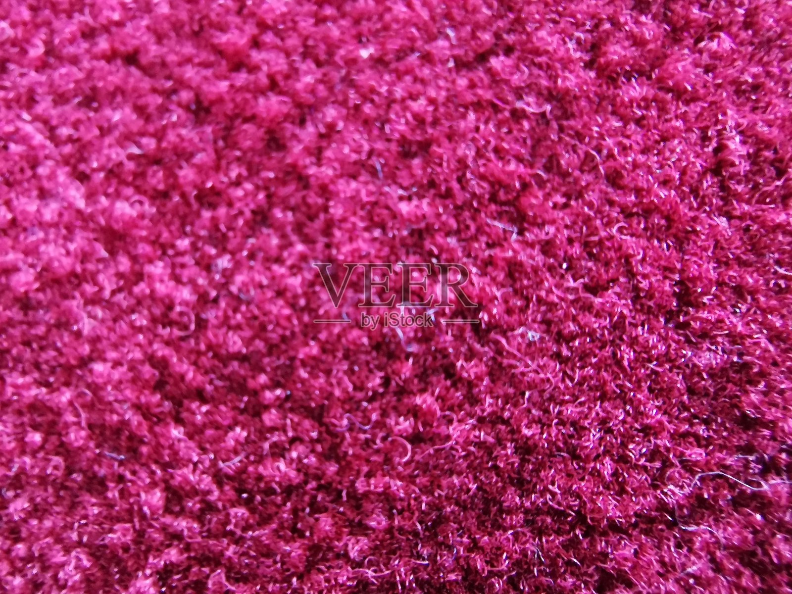 紫色地毯的特写顶部视角纹理背景照片摄影图片