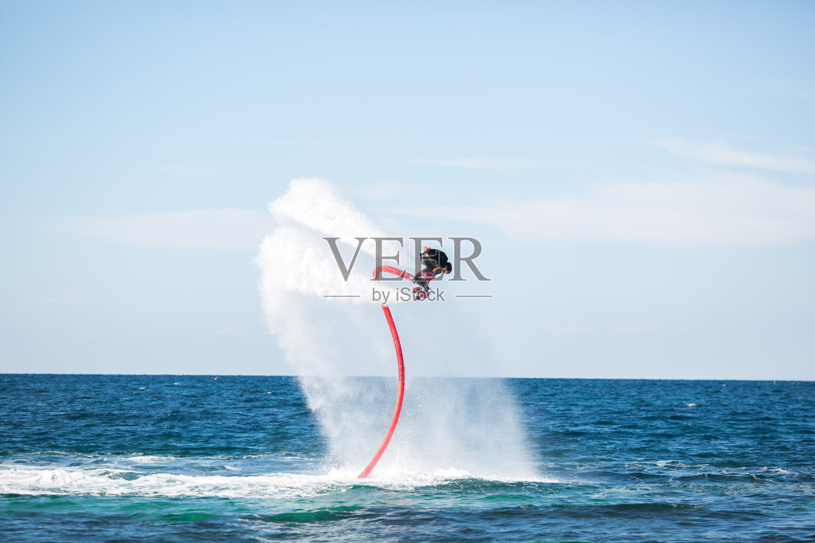 海上飞板骑手的剪影照片摄影图片