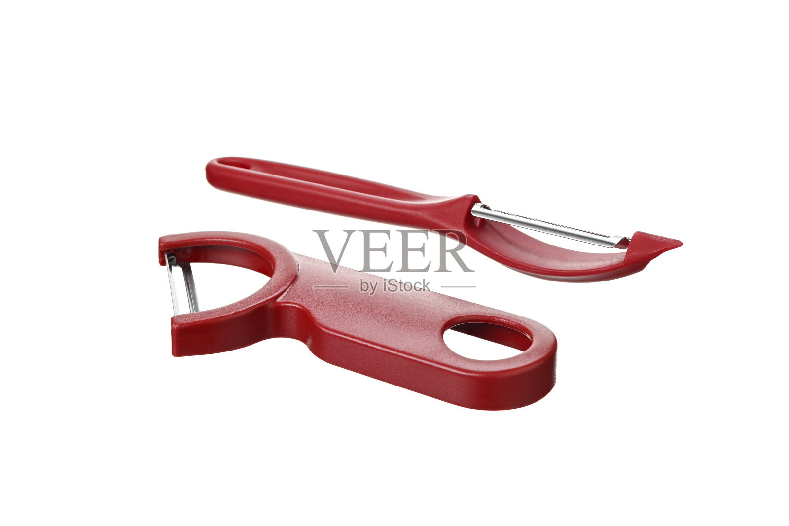 一组红色削皮器，孤立在白色背景上照片摄影图片