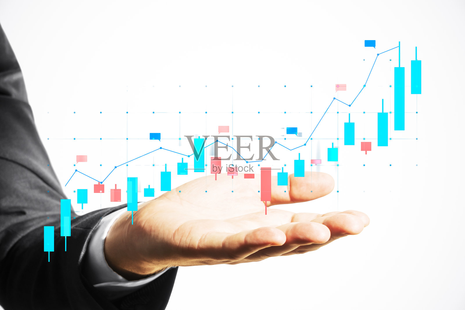 商人手握发光的股票市场图表，图中有蜡烛图形，背景为白色。金融分析概念。照片摄影图片