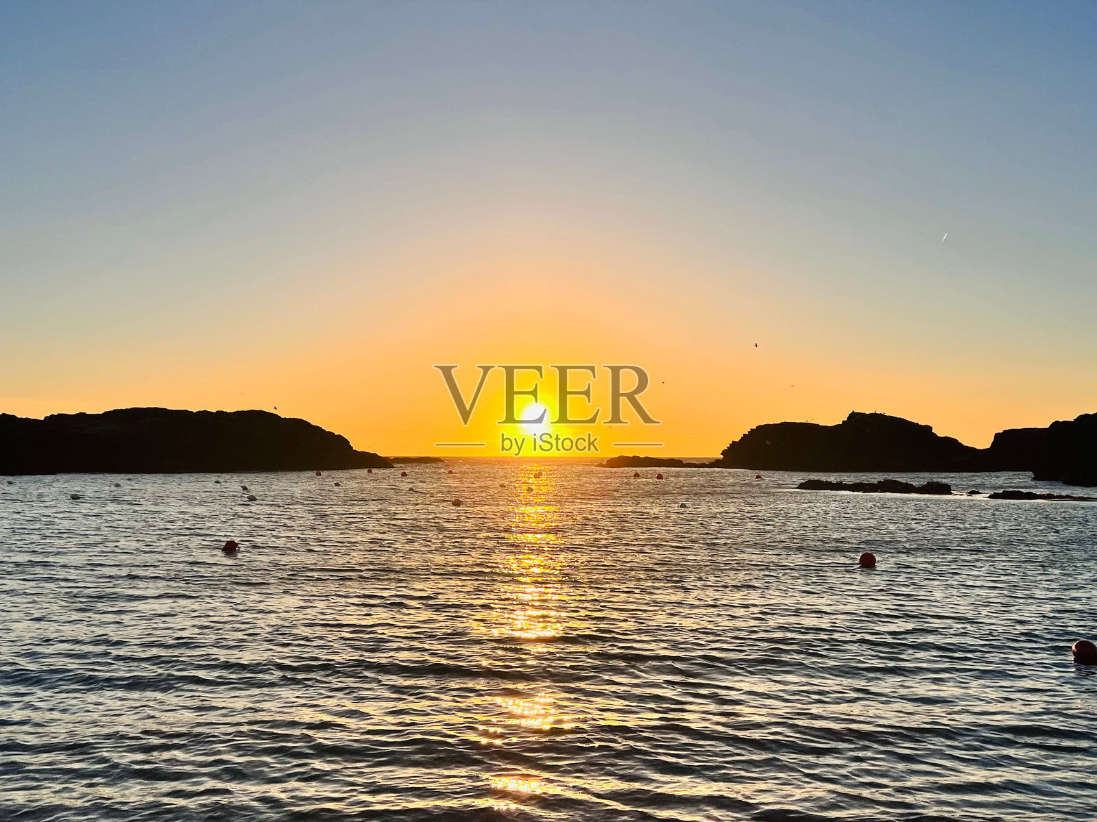 安格尔西岛的日落。照片摄影图片