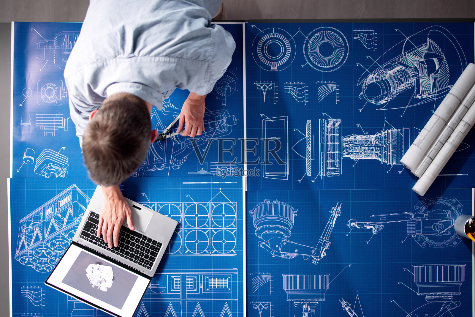 设计行业与发展。工厂中的机器蓝图照片摄影图片