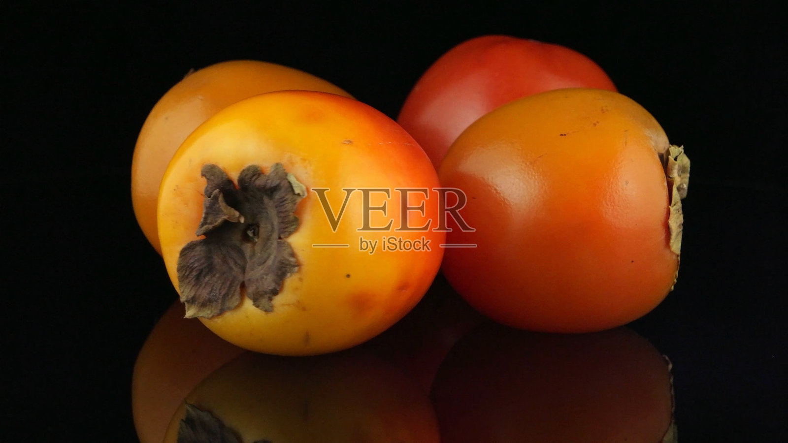 红色成熟的柿子照片摄影图片